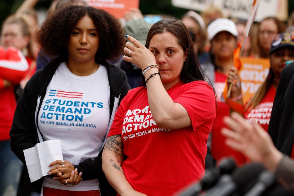 Erica Lafferty in a red Moms Demand Action shirt