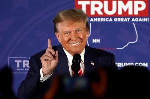 Republican presidential hopeful and former US President Donald Trump gestures as he speaks during a rally in Laconia, New Hampshire, January 22, 2024.