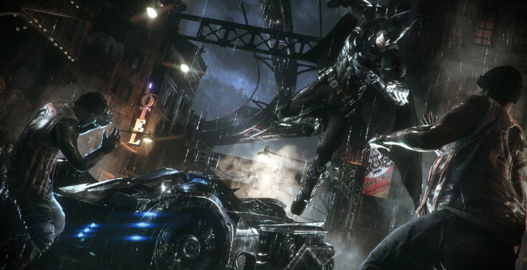 Batman punching some thugs in Batman: Arkham Knight wb games